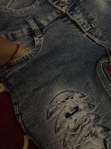Distressed Denim Jeans with 'Girl' Graphic