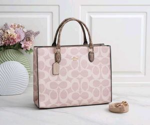 COACH**12A QUALITY HANDBAG* AT OFFER PRICE