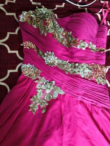 Stunning Magenta embellished gown