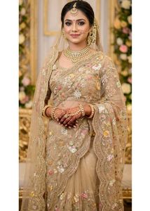 Embellished ivory net saree for engagement