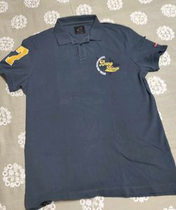 polo tshirt being human L size