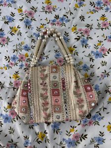 Embroidered Clutch with Pearl Handles