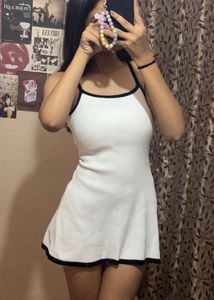 Cute White Mini Dress with Black Trim