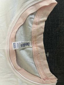 women pink and white tshirt