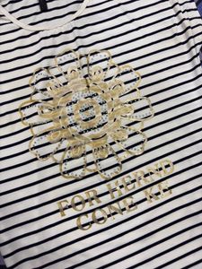 Chic Striped Top with Embellished Flower