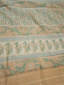 Elegant Beige Saree with Floral Motifs