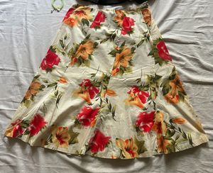 Chic Black Peplum Top &amp; Floral Skirt Set