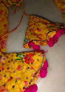 Yellow Floral Lehenga Choli with Pom-Pom Tassels