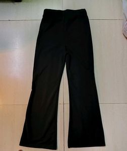 High rise Black Flare Pants with Gold Chain Detail