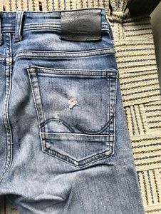 Light Blue Distressed Denim Jeans