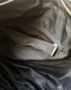Chanel Black Quilted Duffle Bag
