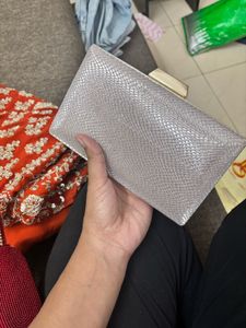 green saree with Clutch Bag