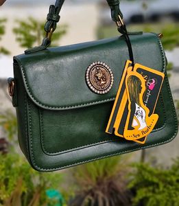 Chic Green Handbag with Gold Accent