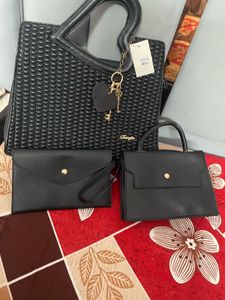 Stylish Black Handbag with Heart Handle