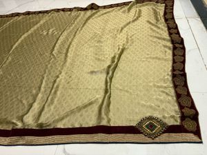 Elegant Cream and Red Saree with Gold Border