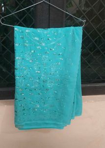 Stunning Teal Saree with Embellishments