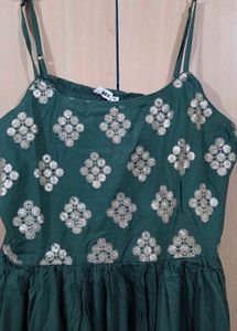 Green Embroidered Maxi Dress with golden jacket