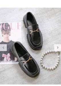 Chic Black Loafers with Gold Buckle