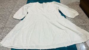 Elegant White dress with Intricate Detailing