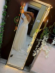 white full length gown with too much detailing