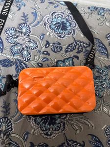 Orange Quilted Crossbody Bag