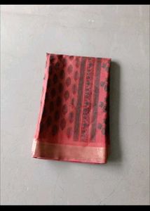 Beautiful Red Saree with Intricate Black Motifs