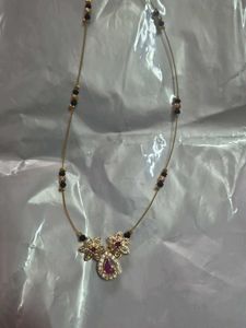 Elegant Gold Necklace with Emerald Pendant