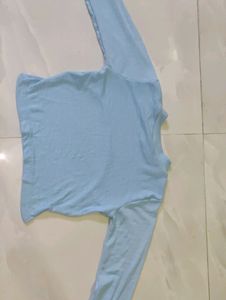 A Blue Crop Top With Crochet