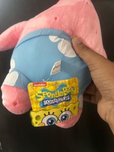 pink Patrick Star plush toy wearing his signature