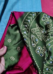 megenta Bandhani Saree with mehndi Border