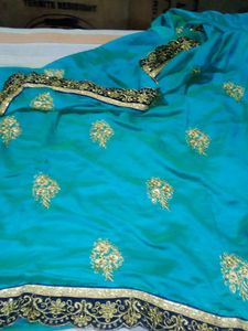 Elegant sea green Embroidered Saree