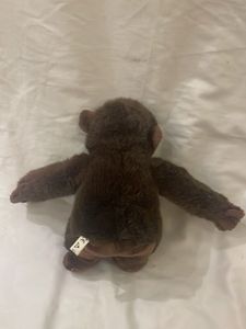 Adorable Plush Monkey with Plaid Bow