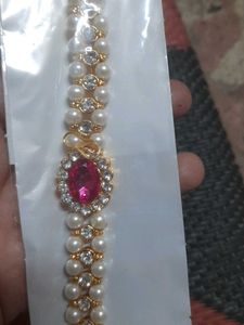 Elegant Pearl and Ruby Bajuband