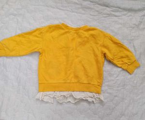 Yellow Ruffle-Hem Sweatshirt