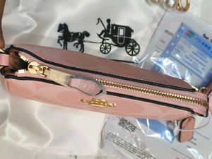 Coach Nolita Gift packaging with charm&amp; pouch 🩷