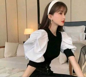 Chic Black Top with Dramatic Puffy Sleeves