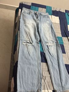 Ripped Knee Jeans