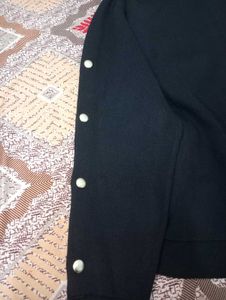 pullover with stylish button up sleeves