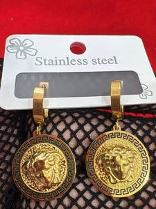 Gold Medusa Head Hoop Earrings