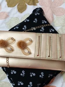 Elegant Gold Clutch with Chain