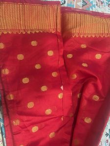 Elegant Red Saree with Gold Polka Dots