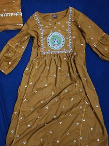Elegant Orange Embroidered Kurta Set