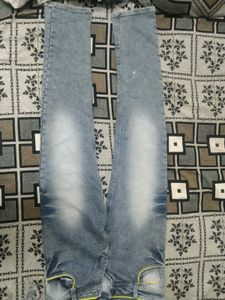 Stylish Blue Denim Jeans with Yellow Accent