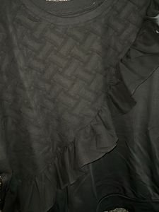 Stylish Black Top with Ruffle Detail