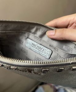 Michael Kors metallic wristlet bag
