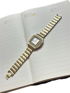 Elegant Gold Watch with Crystals