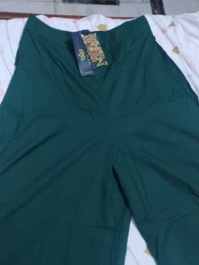 Elegant Green Palazzo Pants with Gold Embellishmen