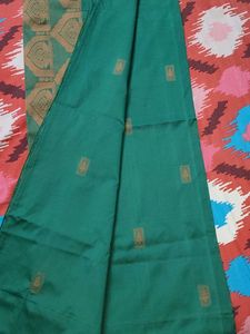 Elegant Green Silk Saree with Intricate Border