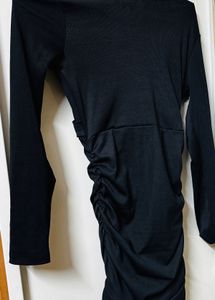 Chic Black Ruffled Mini Dress with tags