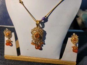 Orenge Locket With Ear Rings